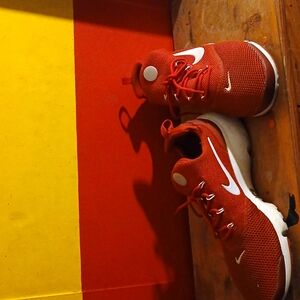 Red and white nikes size 11